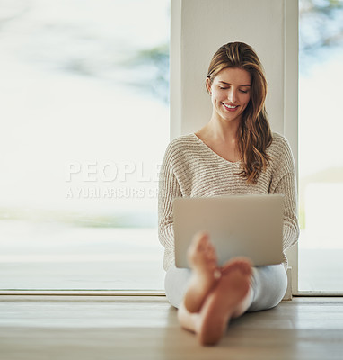 Buy stock photo Shot of a young blonde woman relaxing at home