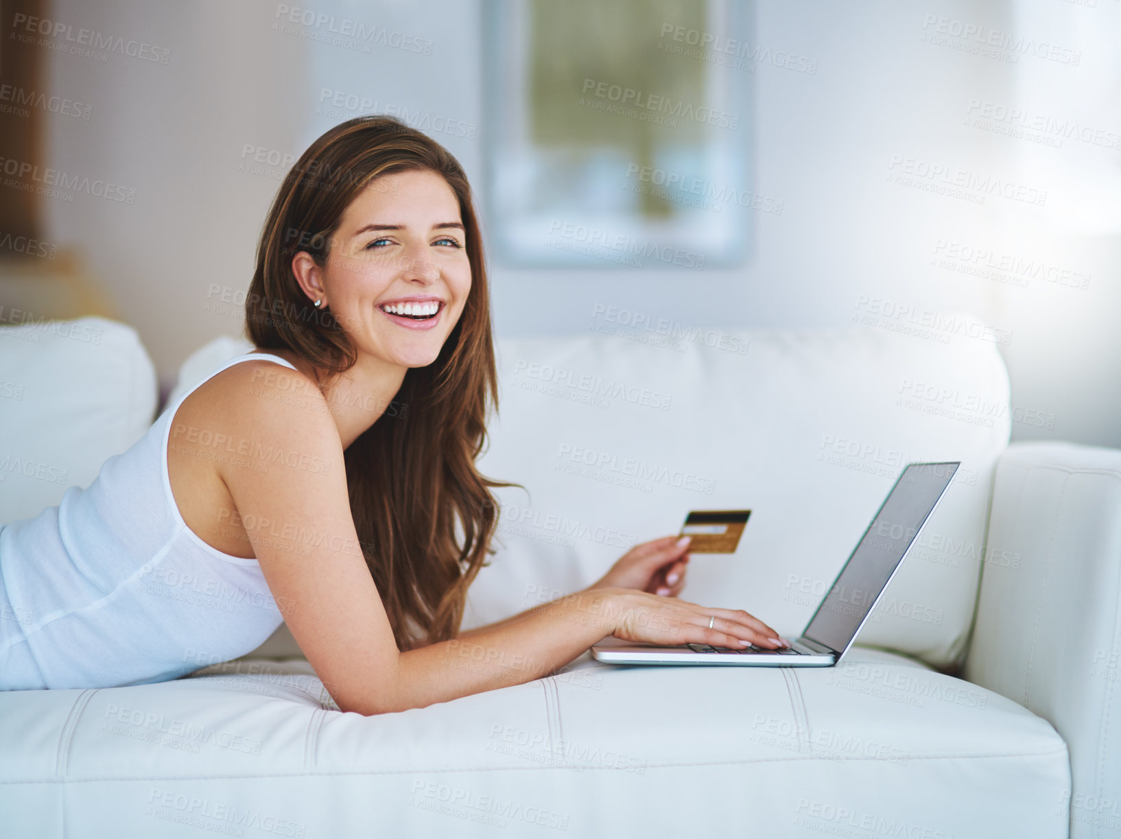 Buy stock photo Woman, home and smile on sofa with laptop for remote work as lifestyle writer and blogger. Female person, freelancer and journalist with blogging for online magazine or newspaper publisher