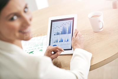 Buy stock photo Portrait of a young businesswoman using a digital tablet