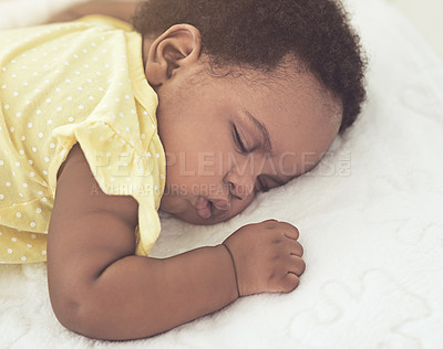 Buy stock photo Black child, tired infant and sleeping in home, peace and quiet for baby dream in nursery bedroom. Growth, development and comfortable kid on blanket, relaxing and nap for fatigue on calm weekend