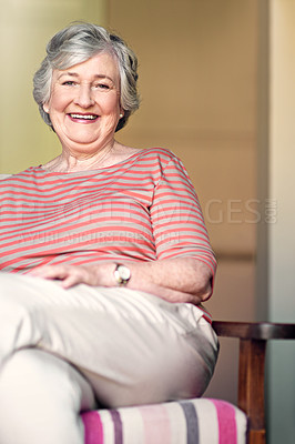 Buy stock photo Shot of a senior woman relaxing at home