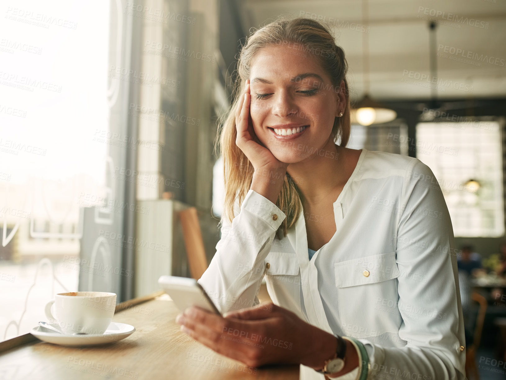 Buy stock photo Woman, relax and scroll smartphone in cafe for social media, reading ebook and watching online video for coffee break. Person, smile and phone in restaurant for checking notification and text message