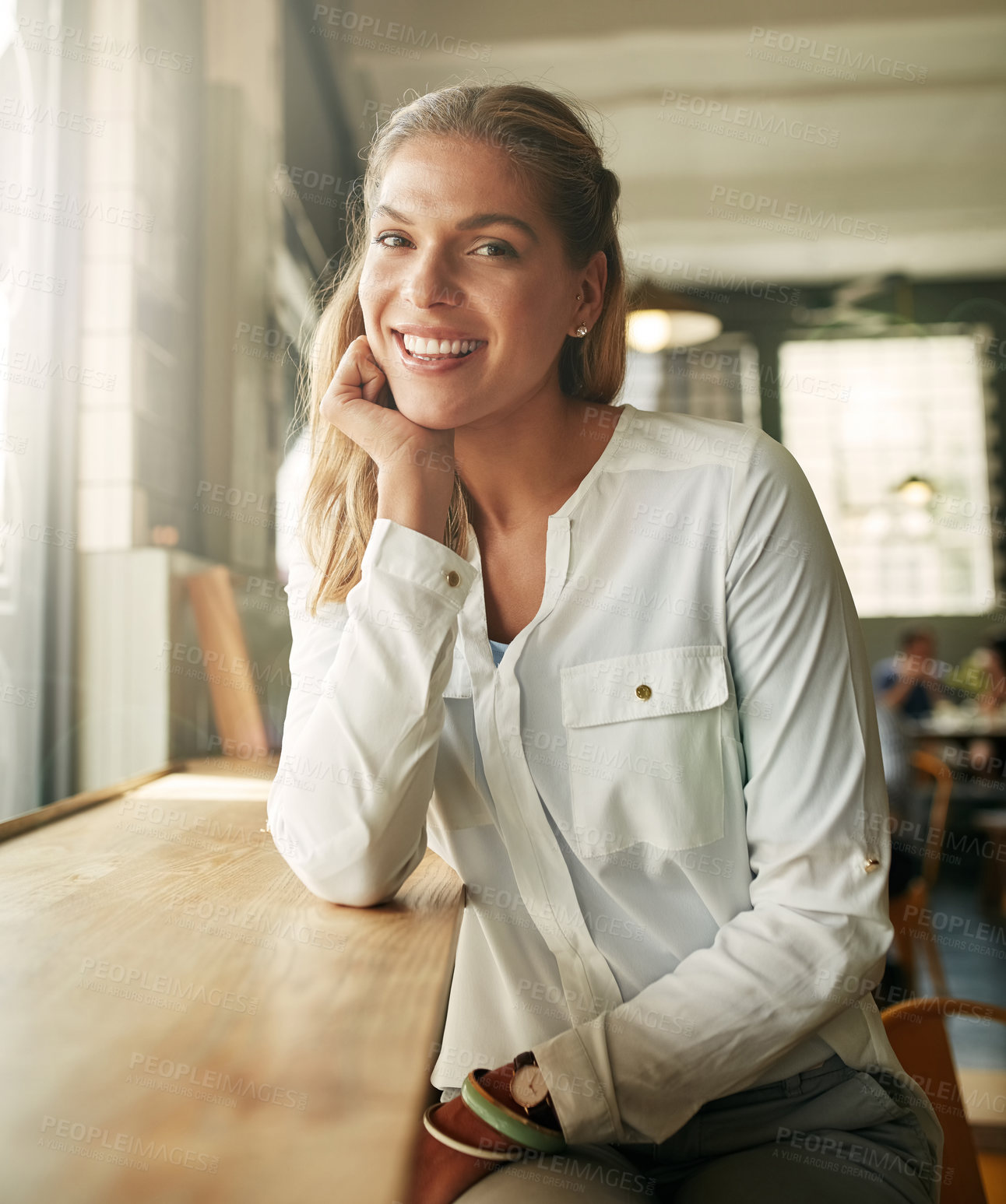 Buy stock photo Business woman, happy and portrait in coffee shop, morning and waiting for breakfast order in diner. Person, smile and start day at cafeteria, restaurant and relax at store with confidence in Germany