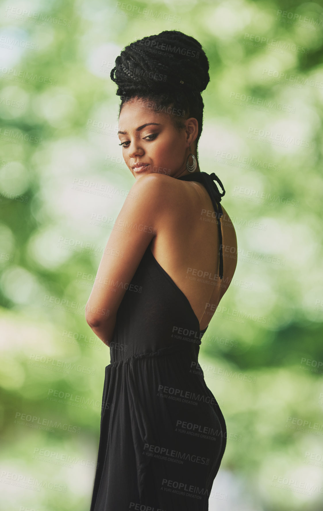 Buy stock photo Proud, fashion and African woman in garden for heritage, culture or tradition with braids. Feminine outfit, confident or elegant model in nature for style sustainability or organic fabric in park