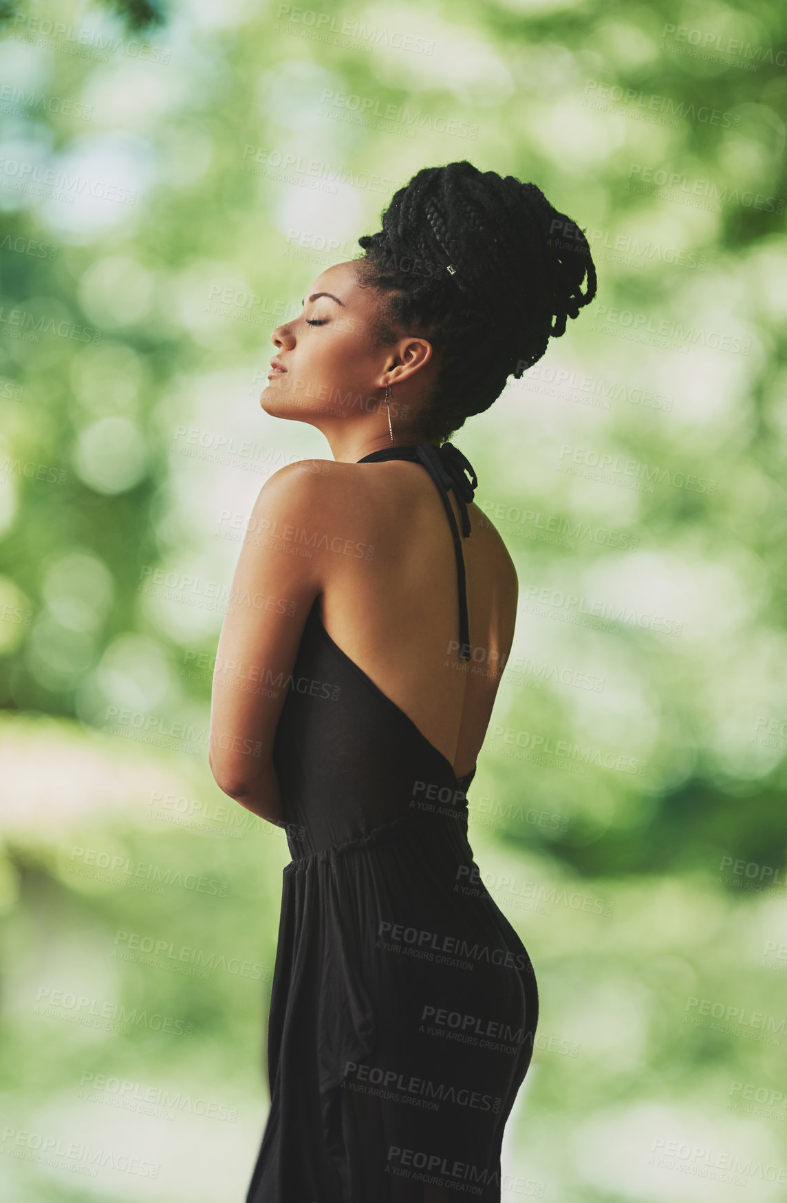 Buy stock photo Calm, fashion and African woman in garden for heritage, culture or tradition with dreadlocks. Natural outfit, confident or elegant model in nature for style sustainability or organic fabric in park