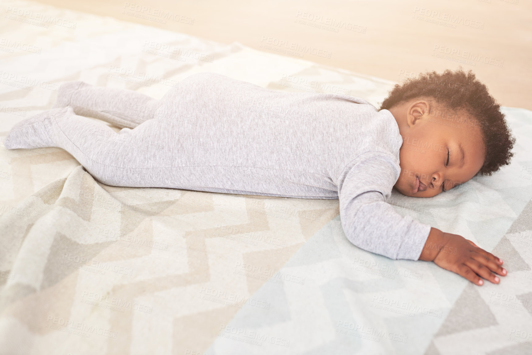 Buy stock photo Bedroom, cute and baby sleeping in home on blanket for rest, nap time and dreaming in nursery. Childcare, newborn and cute, tired and African child in bed sleep for comfortable, relaxing and calm