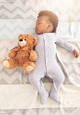 Buy stock photo Teddy bear, bed and baby sleeping in home with lens flare for rest, nap time and dreaming in nursery. Childcare, newborn and cute, tired and African child in bedroom sleep for comfort, relax and calm