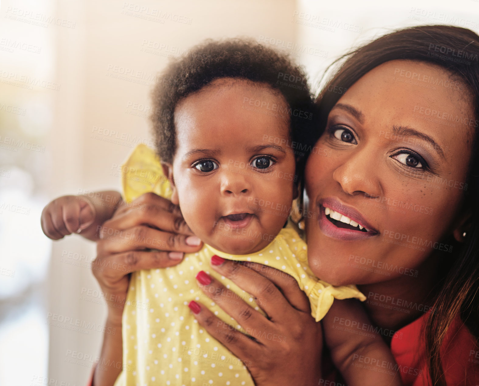 Buy stock photo Portrait of a mother holding up her baby girl