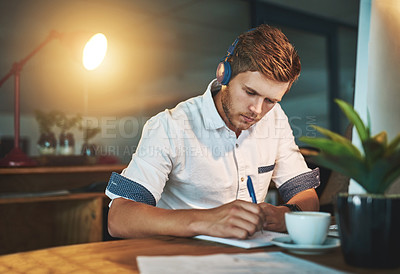 Buy stock photo Shot of a young designer working late