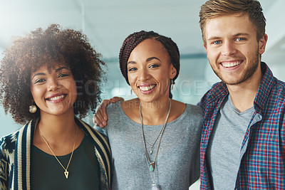 Buy stock photo Portrait of a group of happy and successful young colleagues in a modern office