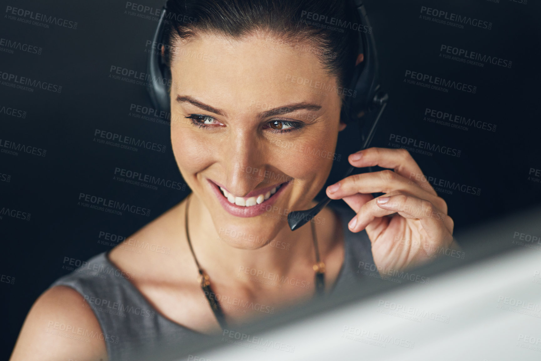 Buy stock photo Cropped shot of a female receptionist working in her office