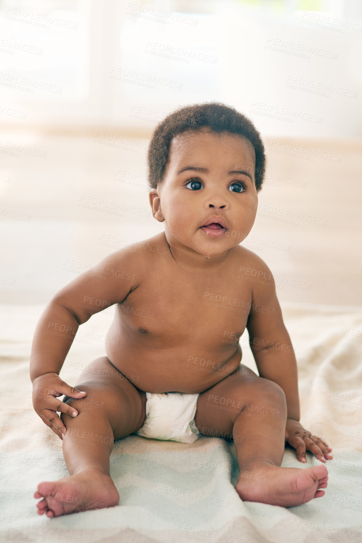 Buy stock photo Shot of an adorable baby girl at home