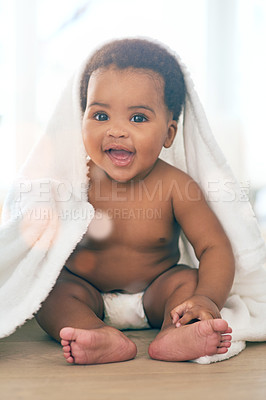 Buy stock photo Cute baby, black kid and blanket for play, game and peekaboo on nursery room floor, happiness and relax. Happy young infant child, girl and smile of healthy development, growth or laughing in house 