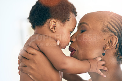 Buy stock photo Happy, touch and nose with mother and baby for bonding, affectionate and connection in family home. Kindness, happiness and smile with black woman holding child for positive, growth and support