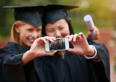 Buy stock photo Selfie, graduation and certificate with student friends on campus together for success at university. Education, achievement and photograph with happy graduate women at college event for scholarship