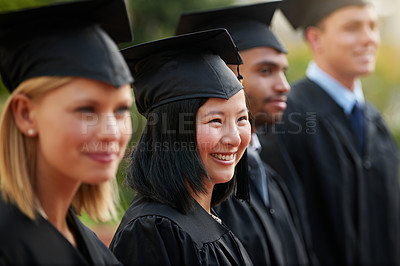 Buy stock photo Graduation, smile and woman student in row with friends for university or college ceremony outdoor. Education, scholarship and success with young person on campus for achievement or celebration