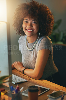 Buy stock photo Portrait of a successful young woman working a late shift at the office