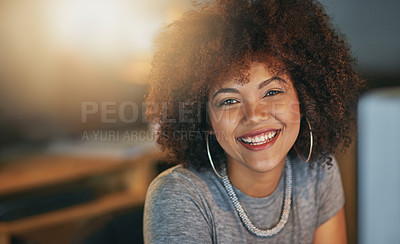 Buy stock photo Portrait of a successful young woman working a late shift at the office