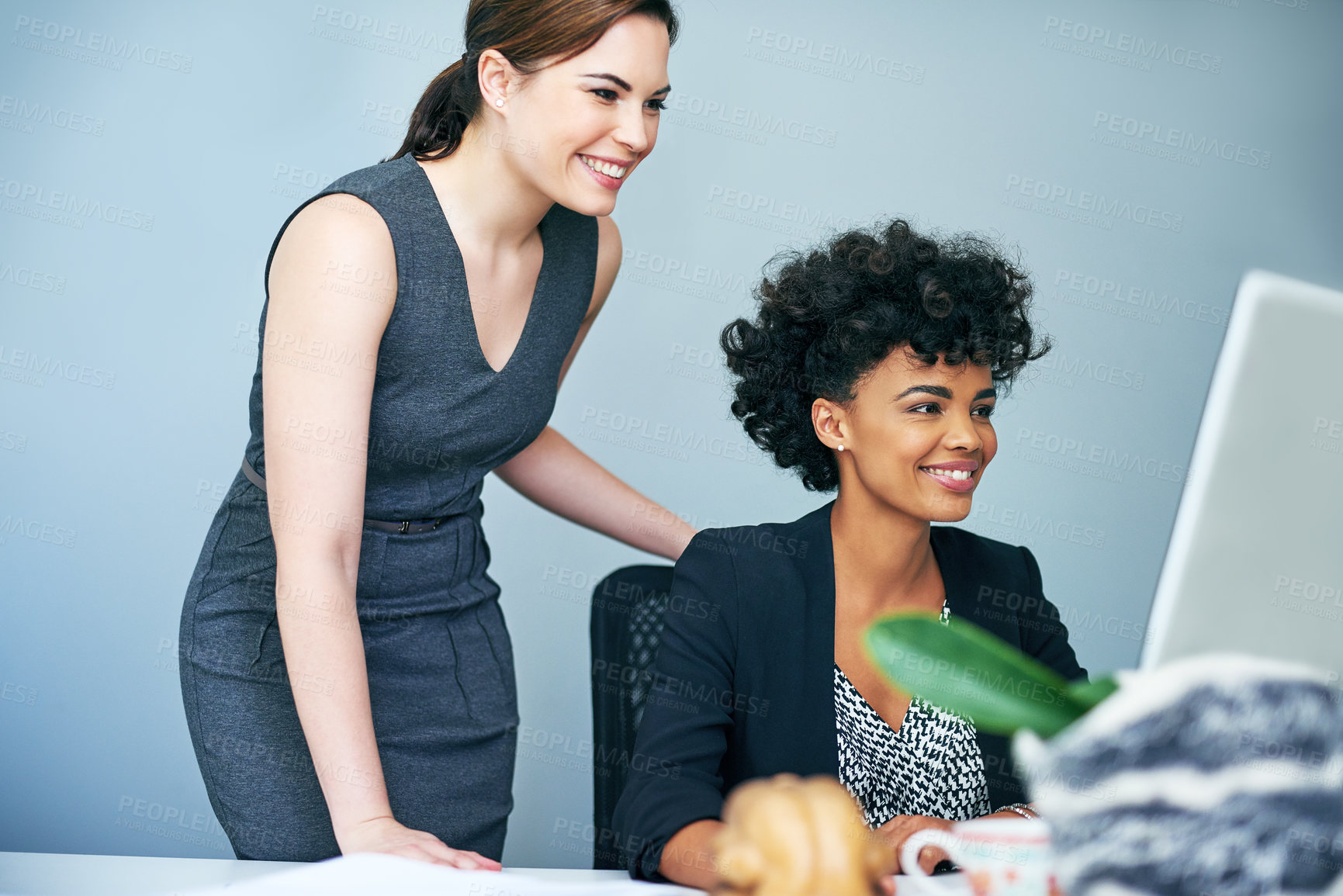 Buy stock photo Business, women and happy on computer at office for digital files or data as administrators. Employees, people and smile or satisfied with coworking as company clerks with teamwork and collaboration