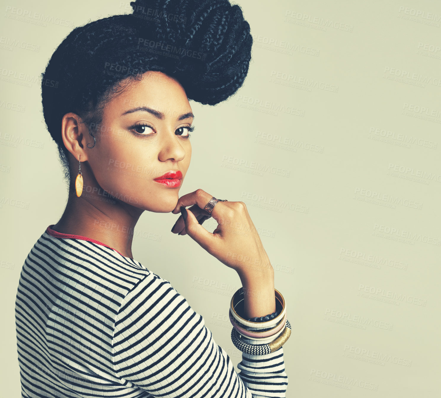 Buy stock photo Shot of a fashionable young woman posing in the studio