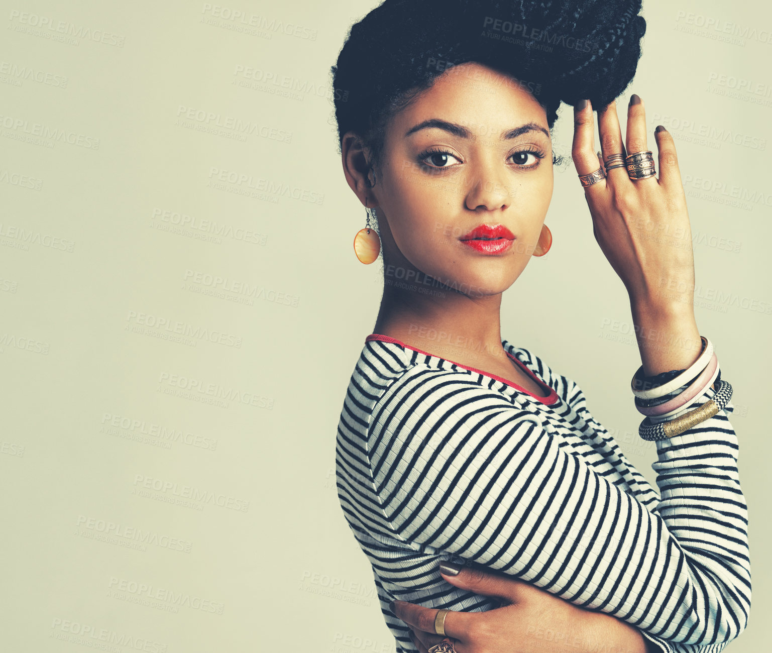 Buy stock photo Shot of a fashionable young woman posing in the studio