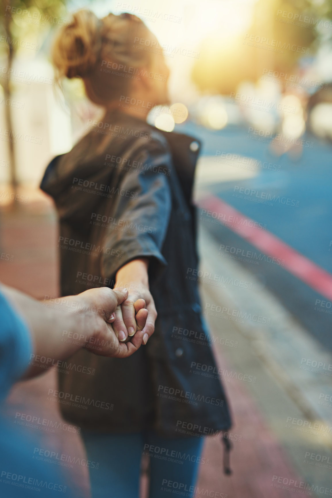 Buy stock photo Love, lead and couple holding hands in city for trip, bonding and connection on outdoor date. Follow, man and woman together in town on vacation, holiday and travel back on journey for tourism pov