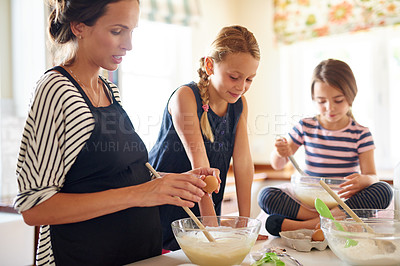 Buy stock photo Mother, family or kids baking in kitchen with siblings learning cookies recipe or mixing pastry at home. Girl, mom cooking or baker helping or teaching children to bake together for child development