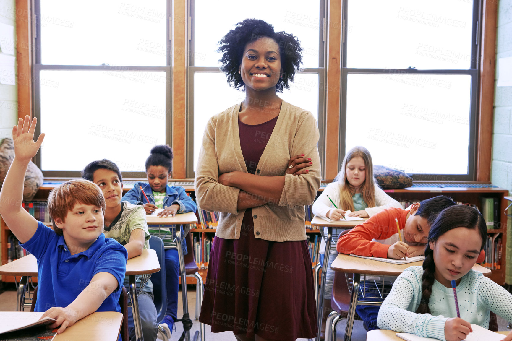 Buy stock photo Portrait, student question and black woman teacher in classroom or middle school. Education, arms crossed or boy raising hand to answer questions, studying or learning help with happy female educator