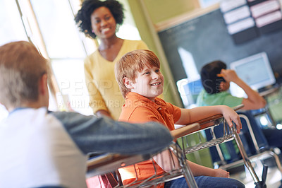 Buy stock photo School, education and children in classroom with teacher enjoying lesson, learning and academic activity. Knowledge, academy teaching and happy young boy talking to friends, students and classmates