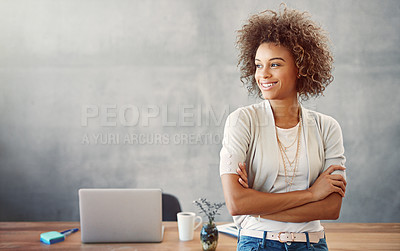 Buy stock photo Shot of a young woman standing in her home office