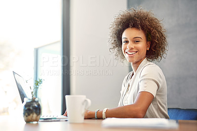 Buy stock photo Portrait of a young woman working on a laptop at home