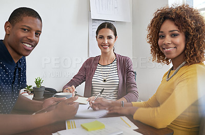Buy stock photo Portrait of a group of colleagues having a meeting in a modern office