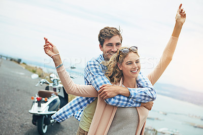 Buy stock photo Shot of a young couple enjoying a day outdoors