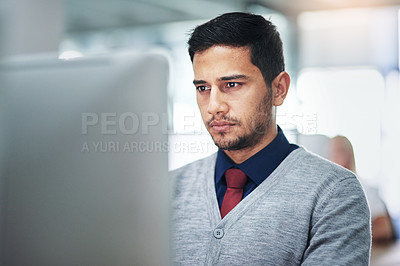 Buy stock photo Cropped shot of a businessman working in the office