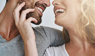 Buy stock photo Shot of a young couple enjoying a relaxing and romantic moment at home