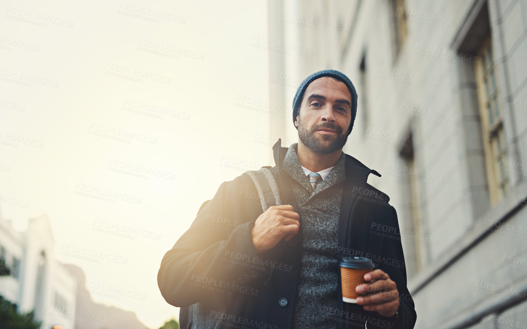 Buy stock photo Winter, portrait and man with coffee in city for work, travel or business commute with confidence. Face, takeaway and person with drink outdoor with trendy fashion clothes or backpack in Los Angeles