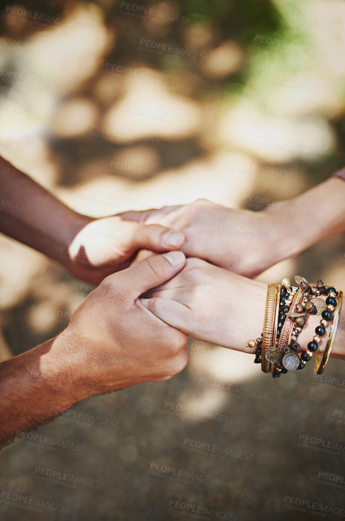 Buy stock photo Cropped shot of a couple holding hands