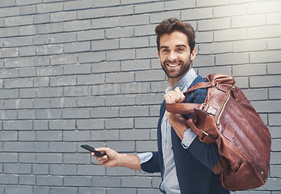 Buy stock photo Businessman, suit and portrait in city with bag and cellphone for corporate career, professional business or company. Young person and confident with formal wear and tech in urban brick wall mockup