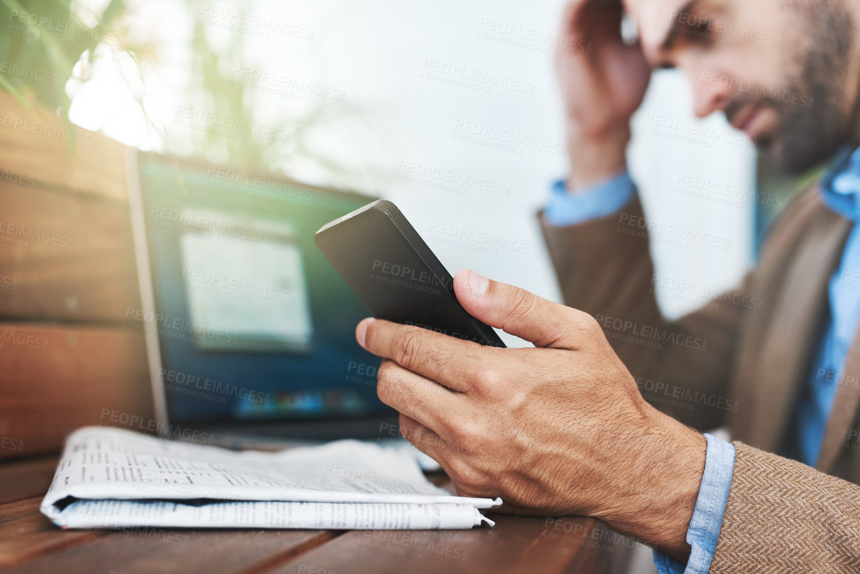 Buy stock photo Closeup, man and smartphone with cafe, laptop and business for remote work recruitment. Job seeker, coffee shop and technology waiting for confirmation, hiring or networking startup for online career