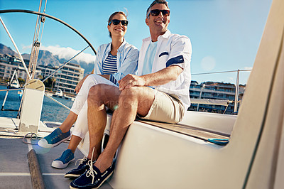 Buy stock photo Relax, travel and luxury with couple on yacht for summer, love and sunset on Cape Town vacation trip. Adventure, journey and ship with man and woman sailing on boat for ocean, tropical and honeymoon