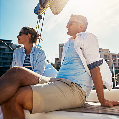 Buy stock photo Shot of a couple out sailing on a yacht