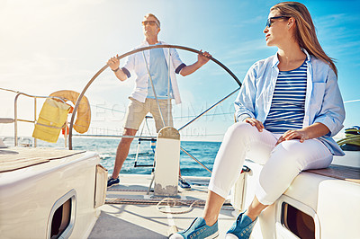 Buy stock photo Relax, travel and luxury with couple on yacht for summer, love and sunset on Rome vacation trip. Adventure, journey and man and woman sailing on boat for ocean, tropical and honeymoon at sea