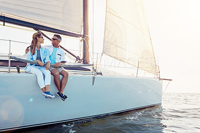 Buy stock photo Travel, relax and couple on boat by ocean for vacation, getaway or weekend trip for romantic date. Love, sailing and mature man and woman on yacht for holiday adventure together by sea at sunset.