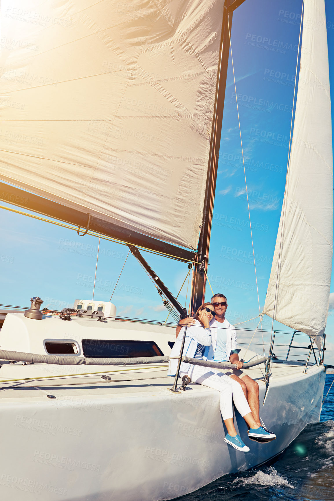 Buy stock photo Travel, sailing and couple on boat by ocean for vacation, getaway or weekend trip for romantic date. Love, sunglasses and mature man and woman on yacht for holiday adventure together by sea at sunset