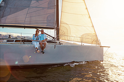Buy stock photo Yacht, sea and love with a mature couple sailing together on water for holiday, vacation or romance. Boat, ocean and date with a senior man and woman bonding while enjoying a trip on the water