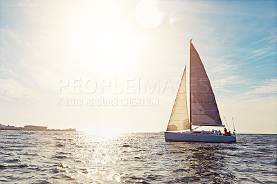 Buy stock photo Mockup, sunset and a yacht at sea for travel, tourism or a luxury summer vacation outdoor. Blue sky, water and wave with a boat on the ocean in nature for an adventure, holiday or getaway with flare