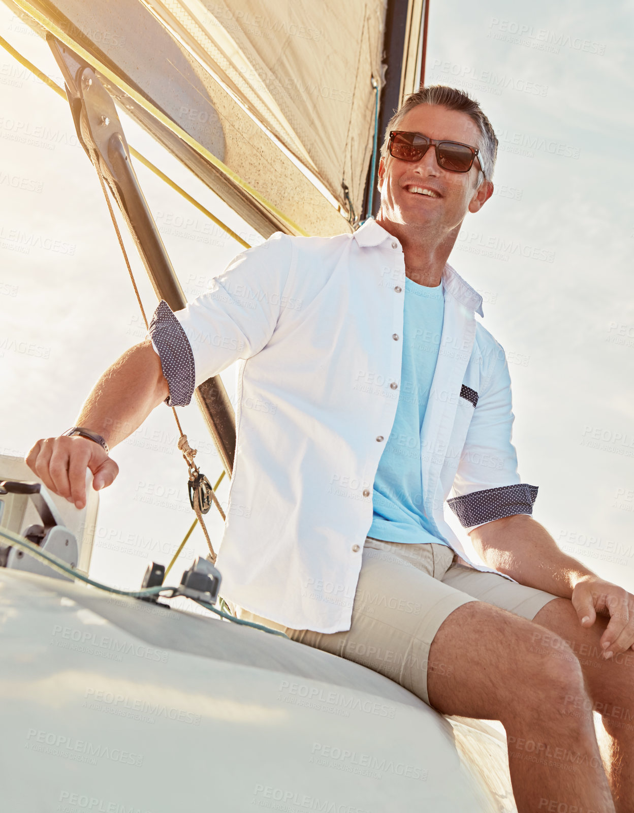 Buy stock photo Sea, view and happy man on boat for travel, vacation or holiday with summer adventure in Greece. Smile, thinking and male tourist on yacht in ocean to relax for tropical weekend trip or fun journey