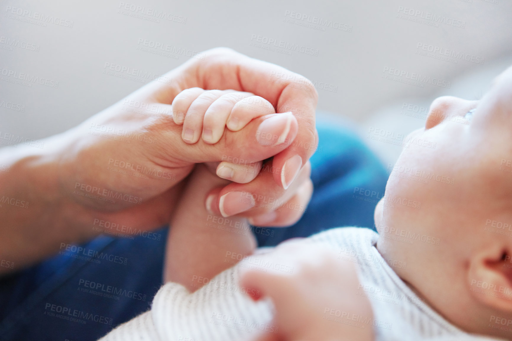 Buy stock photo Closeup shot of a mother holding her newborn baby