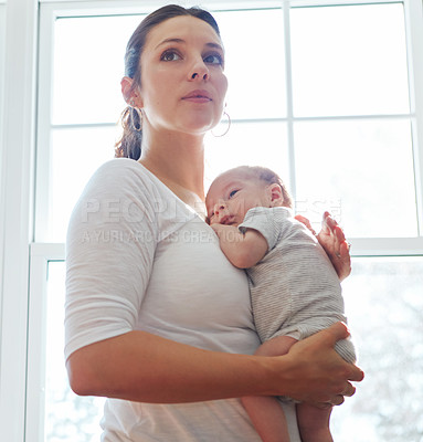 Buy stock photo Shot of a mother holding her newborn baby