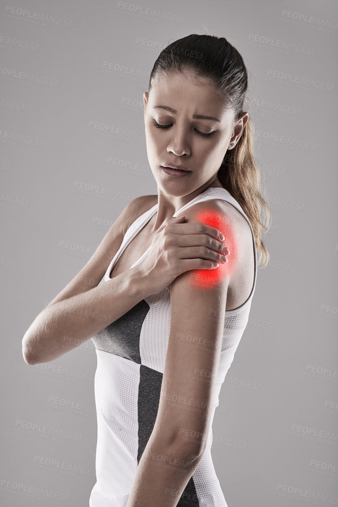 Buy stock photo Fitness, injury and shoulder pain, woman and red glow for muscle or tendon tension on white background. Exercise, athlete and anatomy overlay with inflammation, swollen or strain from training